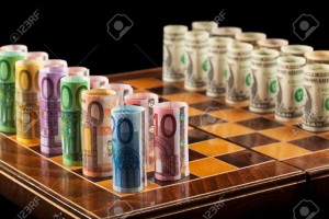 10913306-Euros-and-dollars-on-chess-board-closeup-Stock-Photo-chess-euro-financial